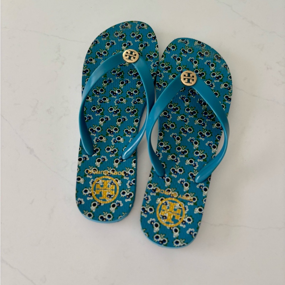 Tory Burch Teal Patterned Logo Flip Flops with Gold Accents
